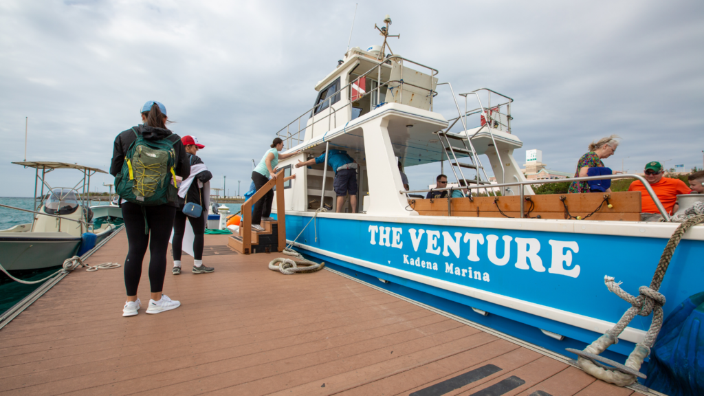 People boarding "The Venture" boat at Kadena Marina.